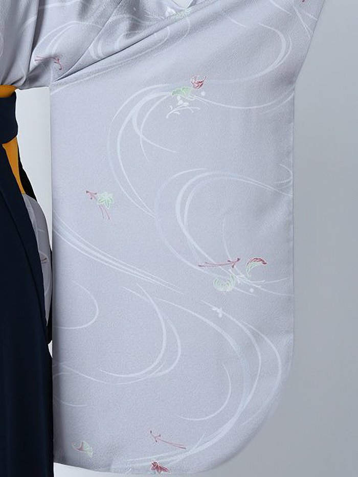 後ろ姿の女性教員