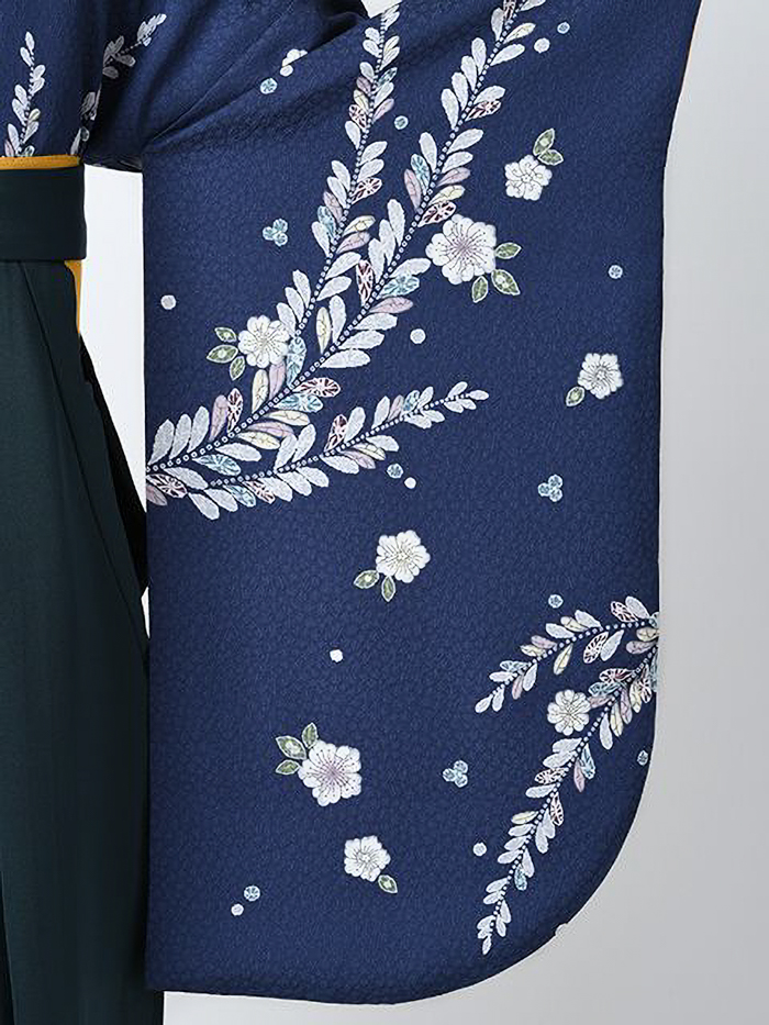 後ろ姿の女性教員