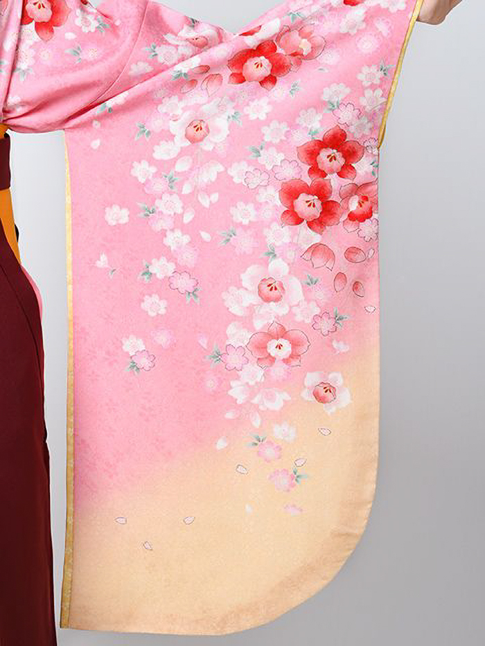後ろ姿の女性教員