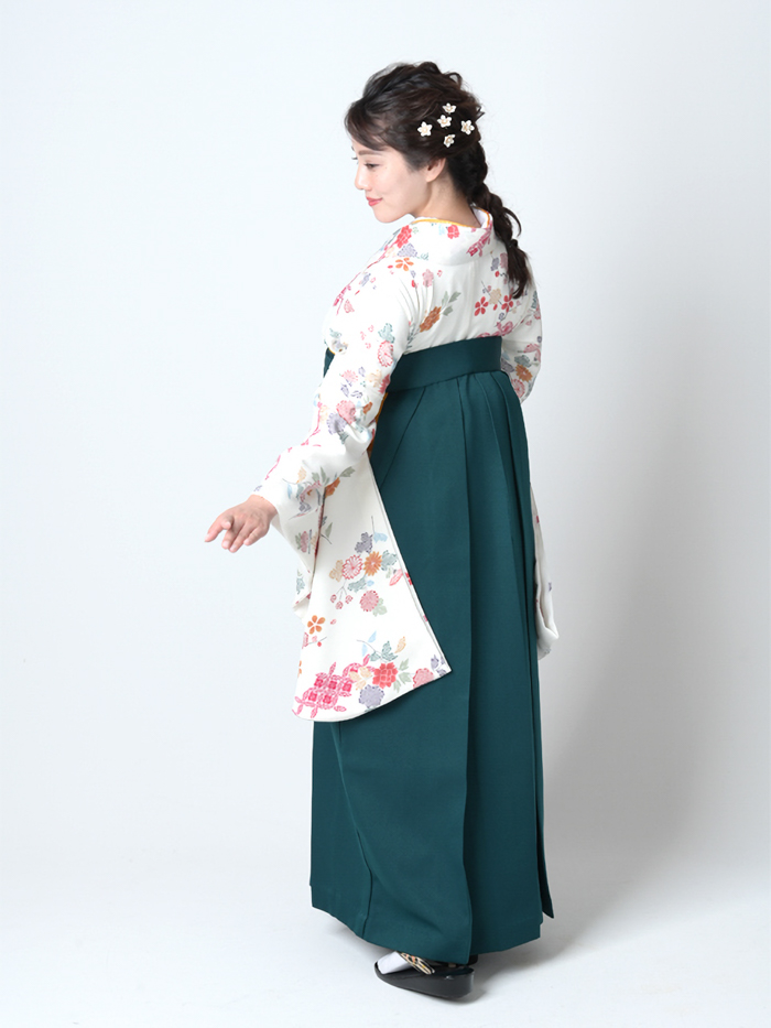 後ろ姿の女性教員