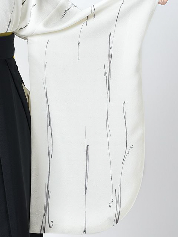 後ろ姿の女性教員