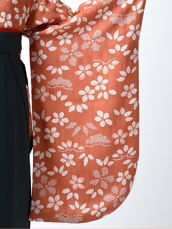 後ろ姿の女性教員