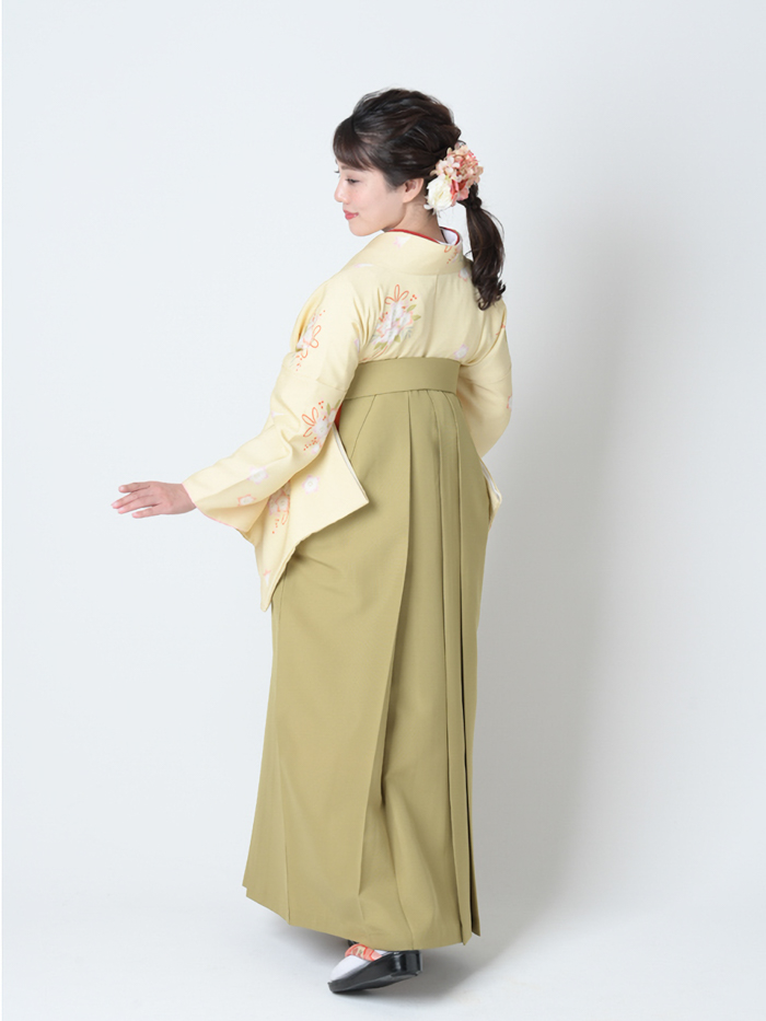 後ろ姿の女性教員