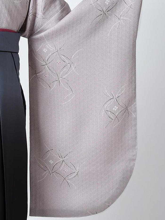 後ろ姿の女性教員