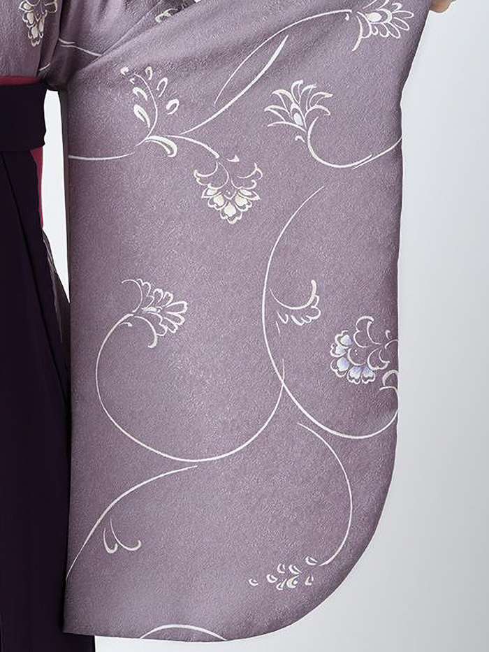 後ろ姿の女性教員